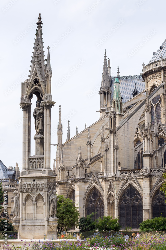 Fontaine de la Vierge and Cathedral Notre-Dame de Paris.