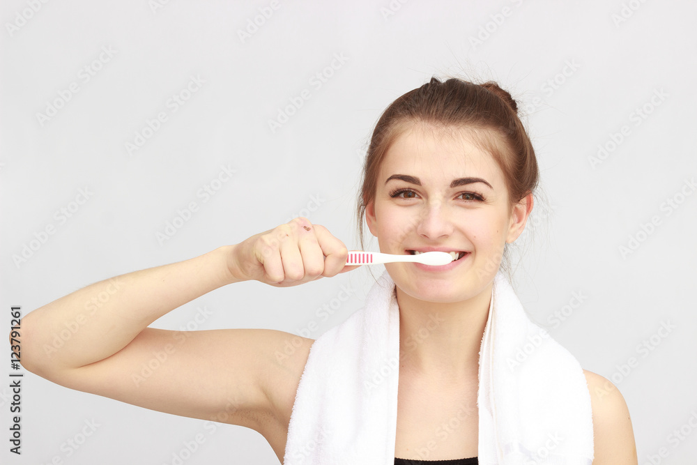 Beautiful woman with a great smile holding toothbrush Beautiful woman with a great smile holding toothbrush