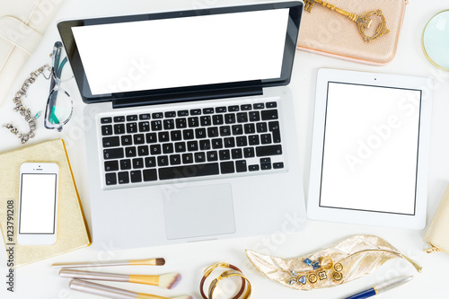 Laptop, tablet and phone with golden woman accessories mock up flat lay styled scene, top view, copy space on blank screen background