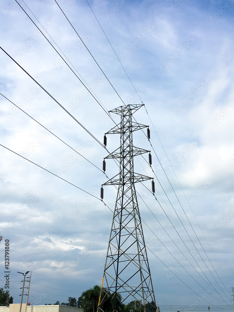 Fototapeta premium High voltage power pole sky background