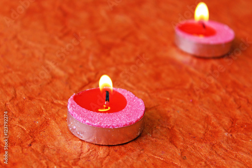 candles on orange background