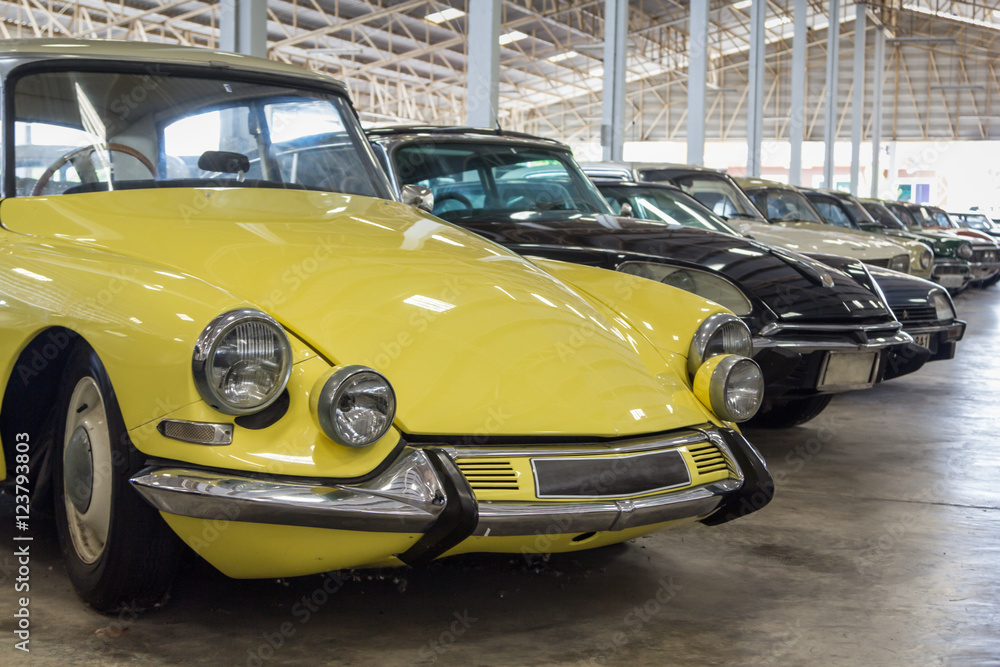 retro and classic car in big garage