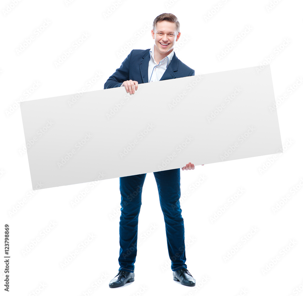 Your advertisement in good hands. Handsome young business man holding big blank with copy space. Isolated on white. Your advertisement in good hands. Handsome young business man holding big blank with copy space. Isolated on white.