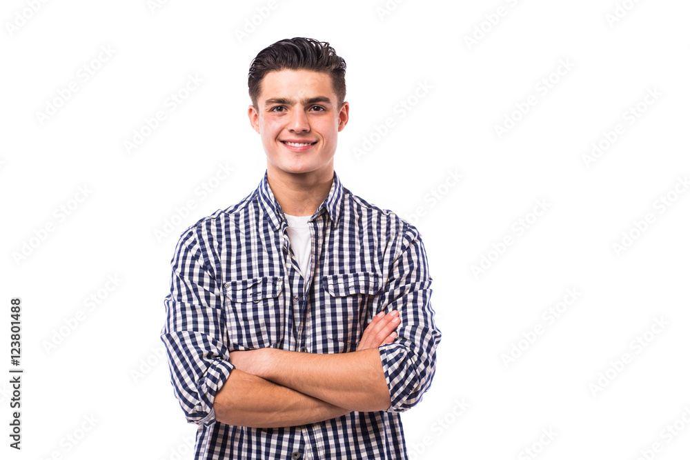 Elegant young handsome man with crossed hands in shirt. Elegant young handsome man with crossed hands in shirt.
