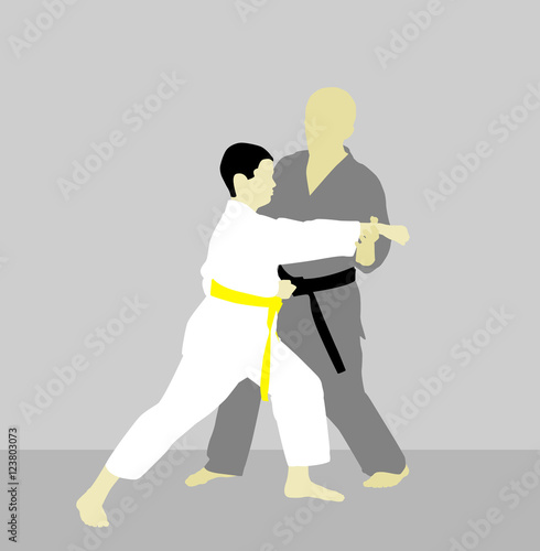 Coach teaches his pupil how to properly make a punch