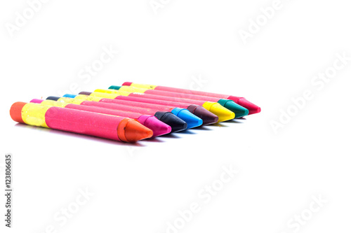 Crayons in row isolated on white