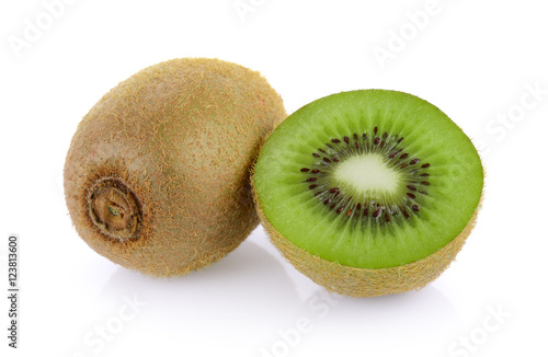 Whole kiwi fruit and his sliced segments on white background