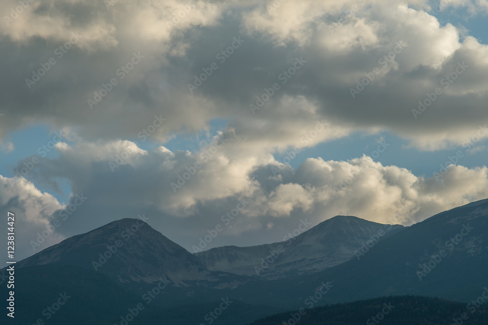 The mountain view on the background of cloud stream. Wide angle The mountain view on the background of cloud stream. Wide angle
