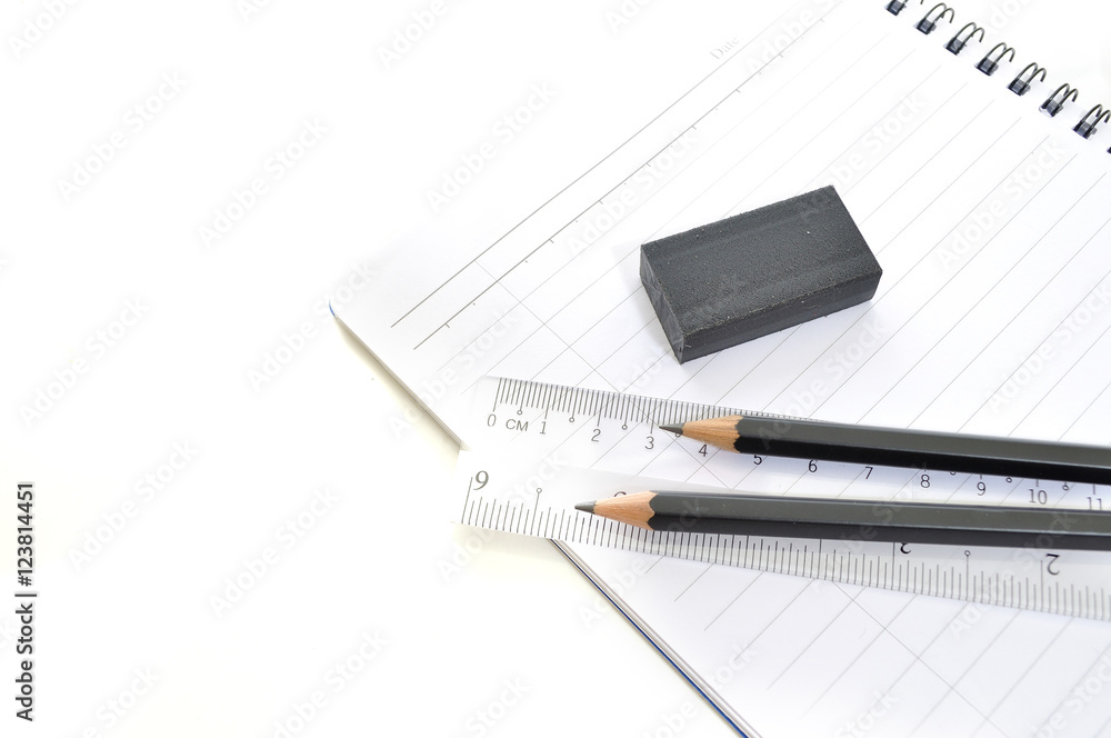 Blank page with pencils, eraser and ruler isolated on white background Blank page with pencils, eraser and ruler isolated on white background