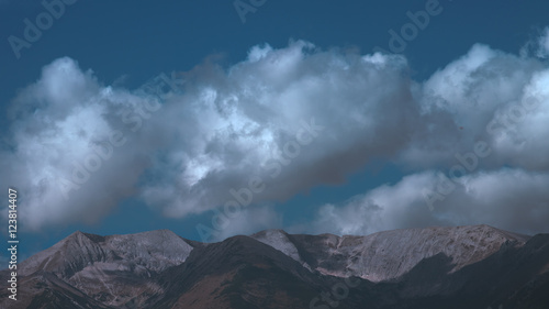 The picturesque mountain on the background of cloud flow. Wide angle © realstock1