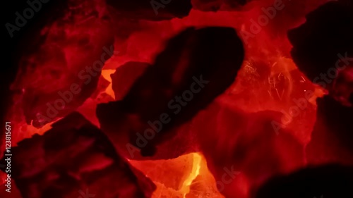 Coal burns in a furnace.