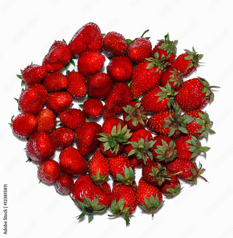 Lots of ripe, fresh, juicy, strawberries are laid in circle, isolated on white background. Lots of ripe, fresh, juicy, strawberries are laid in circle, isolated on white background.