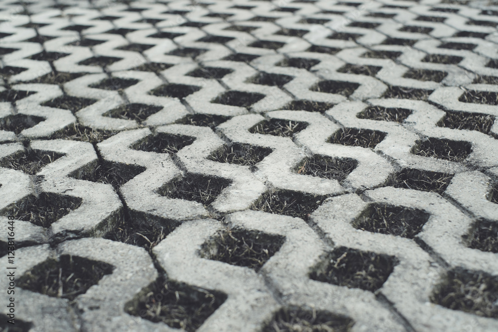 Fototapeta premium patterned paving tiles, cement brick floor background