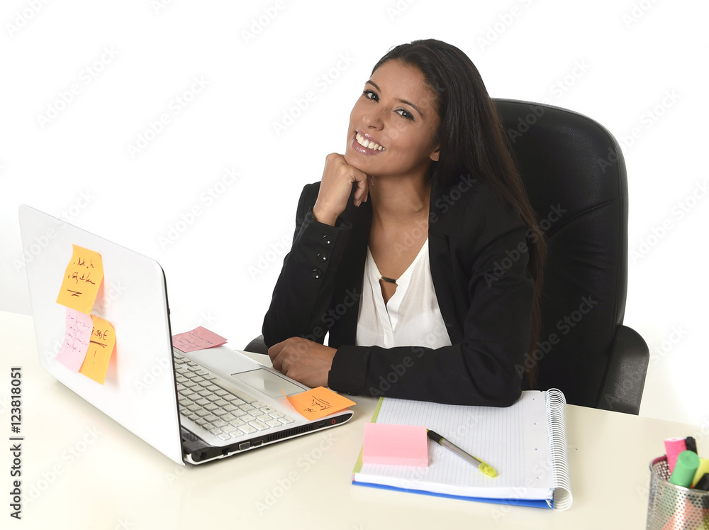 attractive hispanic businesswoman sitting at office desk working on computer laptop smiling happy attractive hispanic businesswoman sitting at office desk working on computer laptop smiling happy