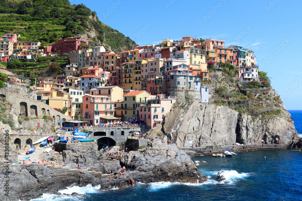 Cinque Terre village Manarola with colorful houses and Mediterranean Sea, Italy