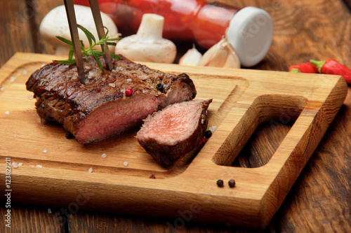 Beef steak on a fork