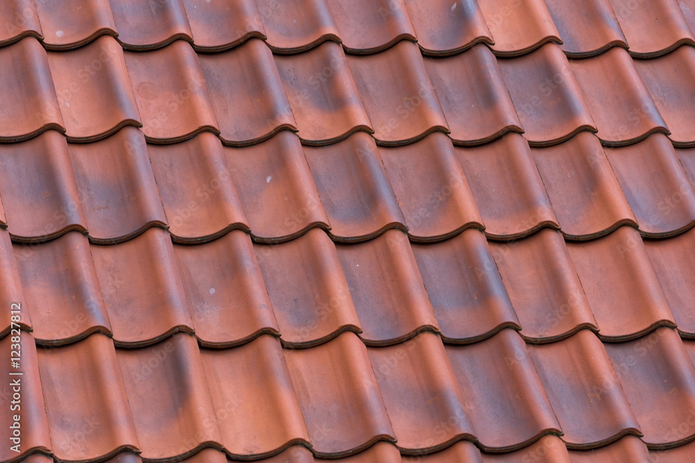 Red tiles roof background