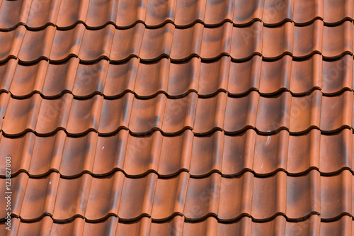 Red tiles roof background © romantsubin