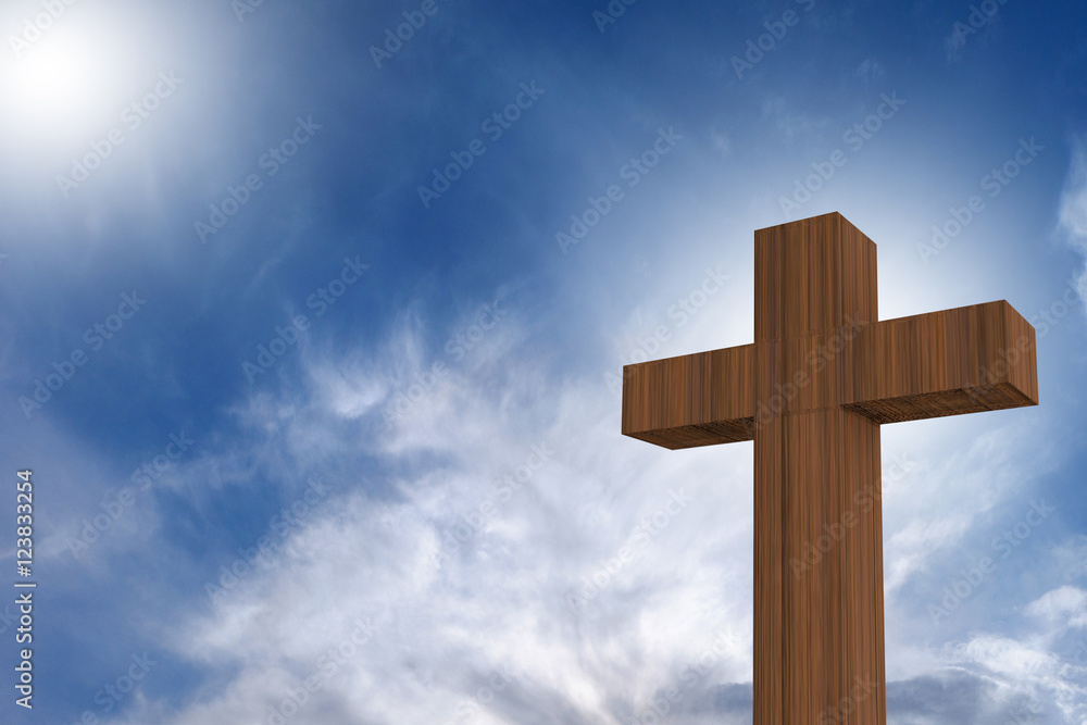 3D rendering of wooden cross on a blue sky with sunlight