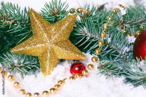 Composition with Christmas decorations fir tree on white background © Natalia