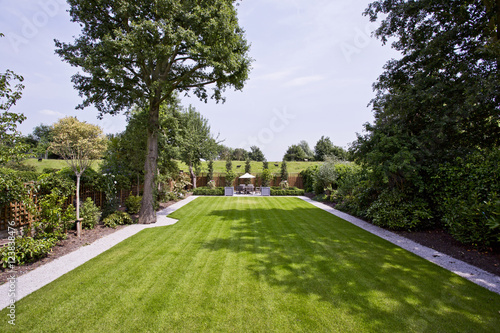 massive garden with perfectly trimmed lawn