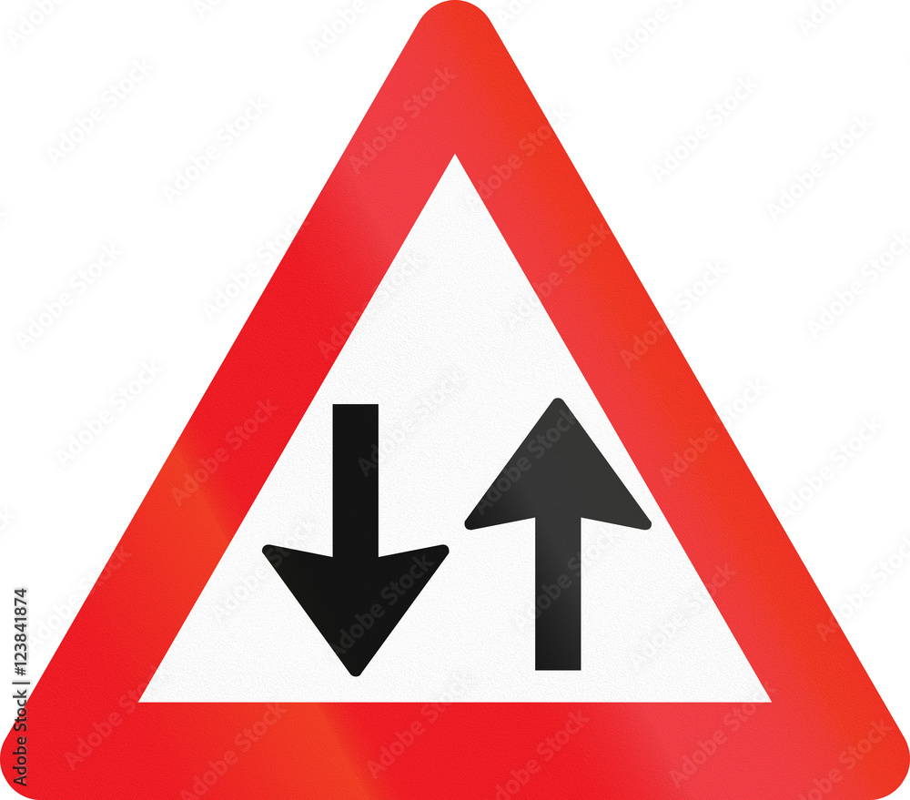 Warning road sign used in Denmark - Opposing traffic Warning road sign used in Denmark - Opposing traffic