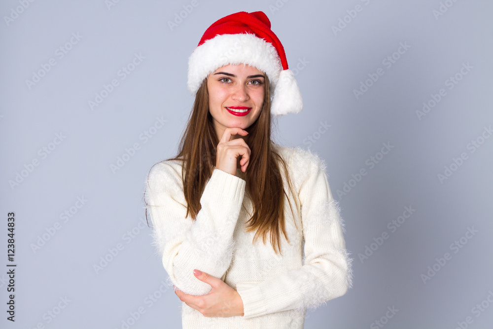 Woman in red christmas hat Woman in red christmas hat