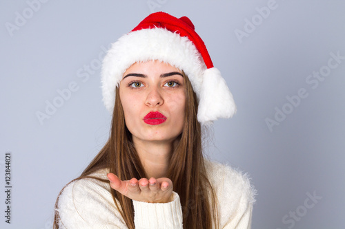 Woman in red christmas hat