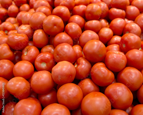 Ripe organic tomato on shelf in local farmers store © bjphotographs