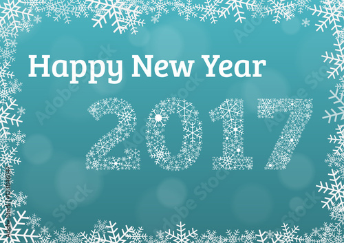 Happy new year 2017 light blue card card with snowflake frame and year 2017 made of white snowflakes with enough space for your signature