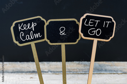 Obraz na płótnie Keep Calm and Let It Go message written with chalk on mini blackboard labels