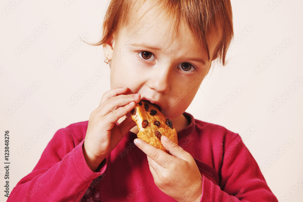 beautiful little baby girl eating Chocolate Chip Cookie beautiful little baby girl eating Chocolate Chip Cookie