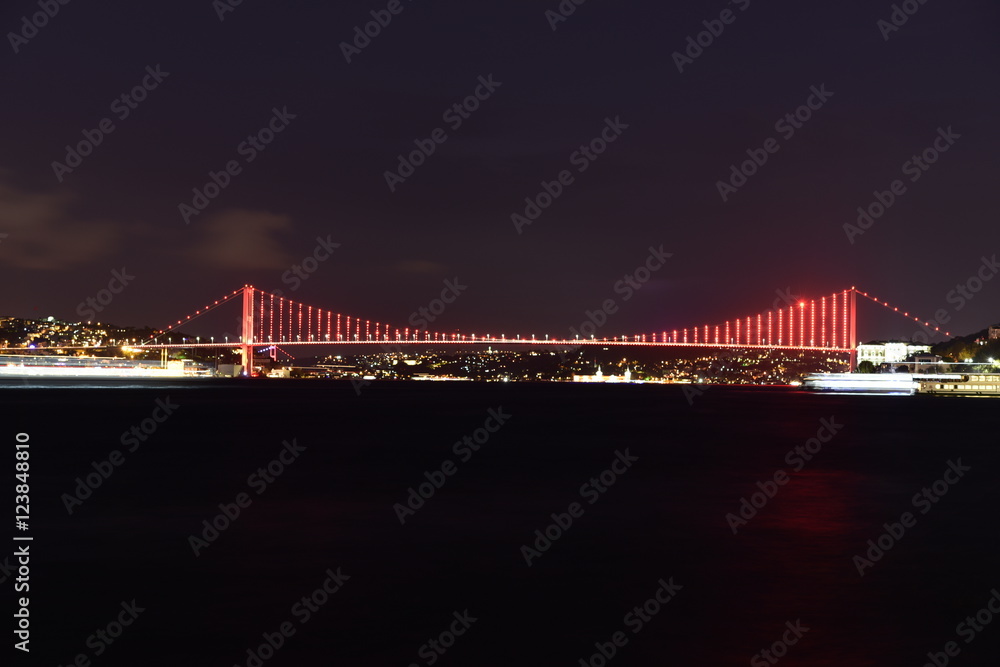Fototapeta premium Istanbul bosphorus bridge with red lights at night