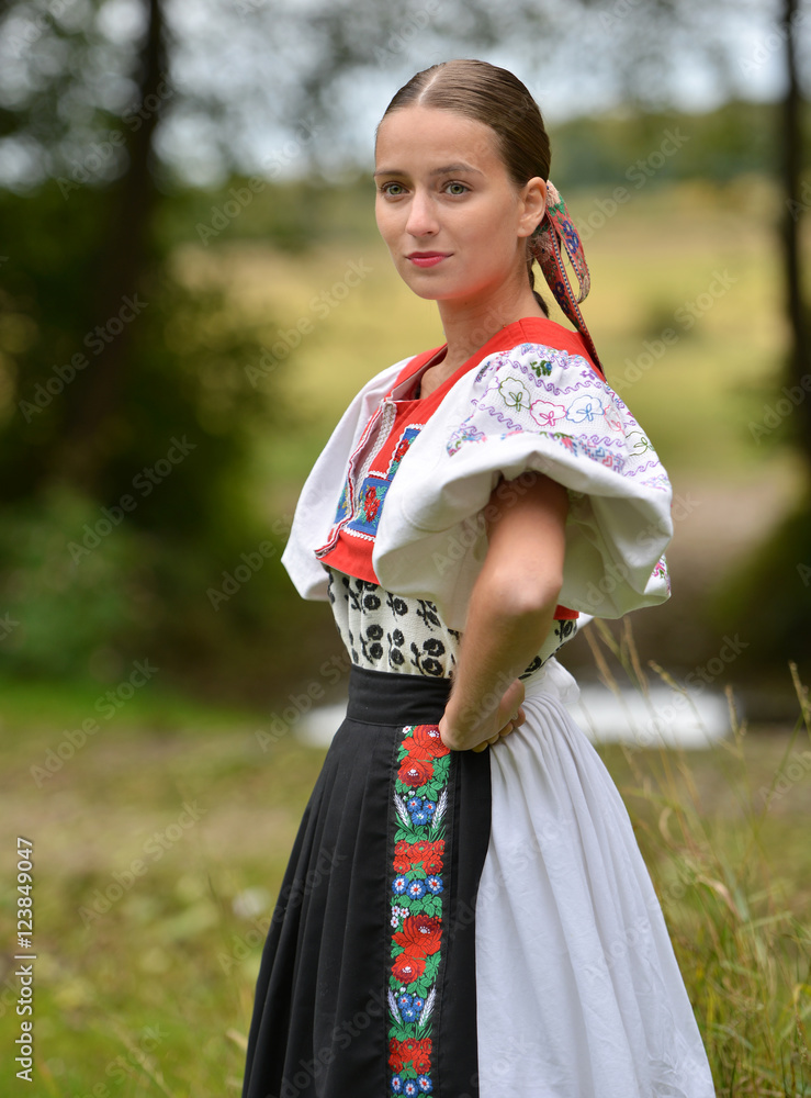 Woman of Slovak folk dance with colorful clothes