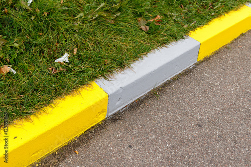 Coloured edge of the road curbs