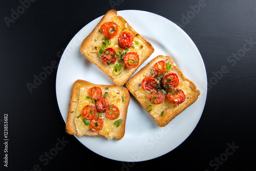 Grilled toast with camembert and cherry tomatoes
