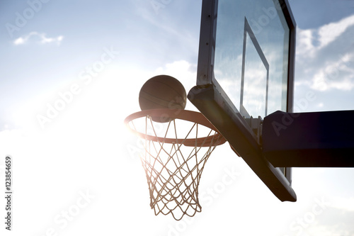 Basketball going through the basket