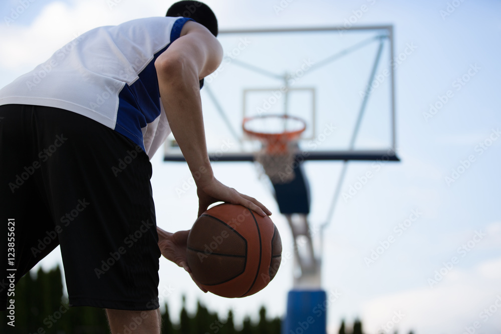 Fototapeta premium Basketball player training on the court. concept about basketbal