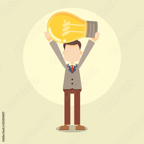 businessman lifting bulb