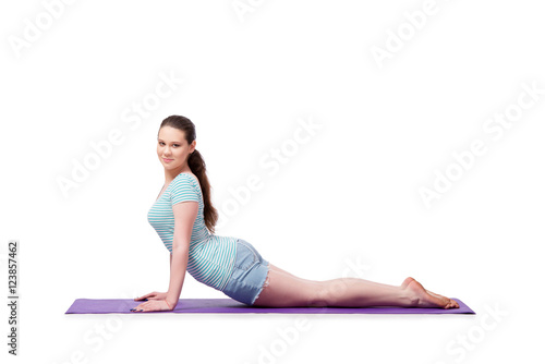 Young woman in sports concept isolated on the white