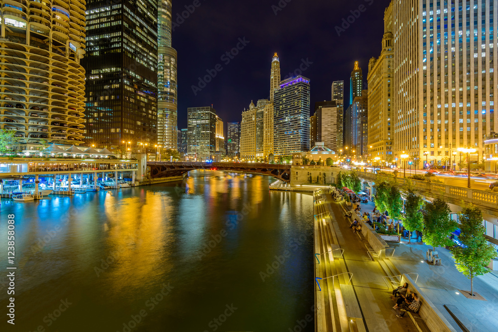 Fototapeta premium Chicago River skyline with urban skyscrapers at night, IL, USA