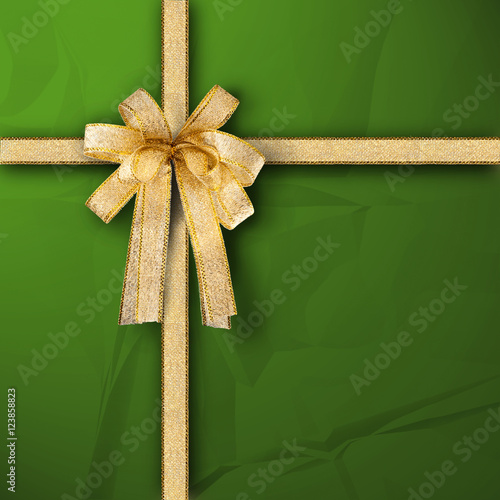 Green wrapping gift box with gold pattern bow tie