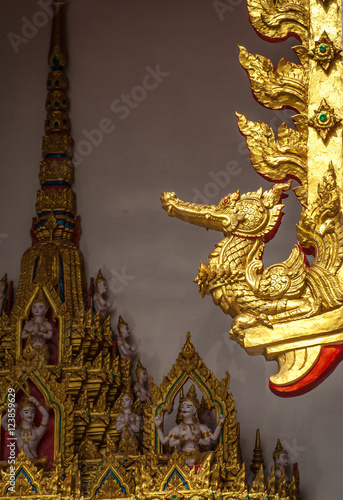 Golden swan statue at the temple Chanthaburi, Thailand. © suwapol1956