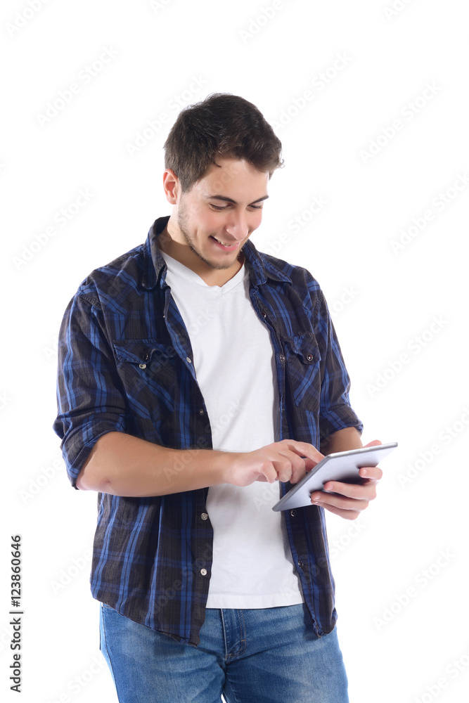 Portrait of a young latin man using tablet. Isolated white backg Portrait of a young latin man using tablet. Isolated white backg