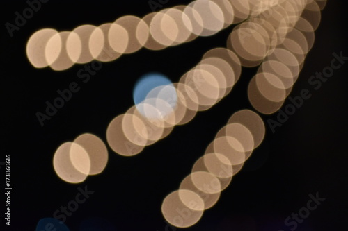 Photo of bokeh lights on black background.