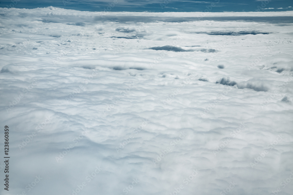 White clouds, view from above airplane White clouds, view from above airplane