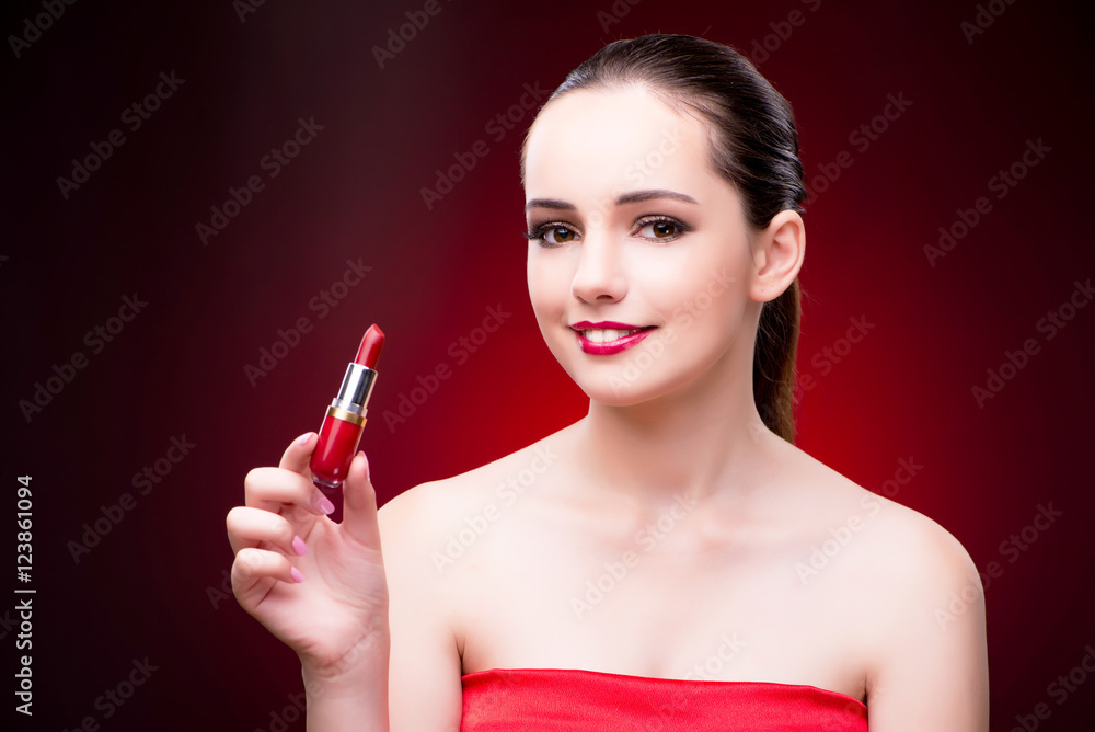 Woman with red lipstick in beauty concept Woman with red lipstick in beauty concept