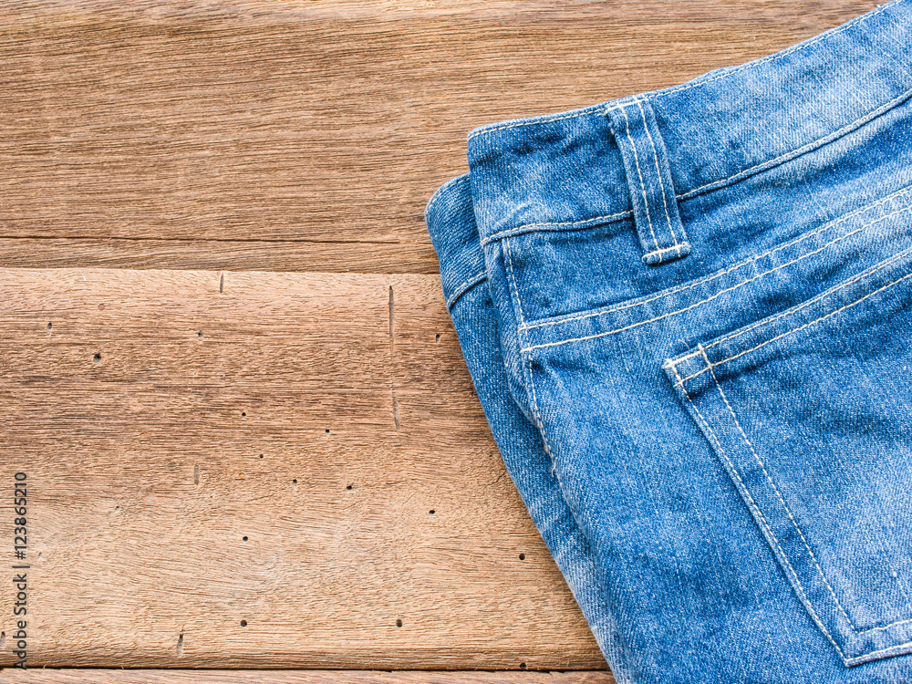 Short jean on wood background
Short jean on wood background