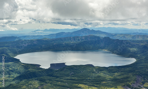 Crater Karymsky Lake. Kronotsky Nature Reserve on Kamchatka Peninsula. photo