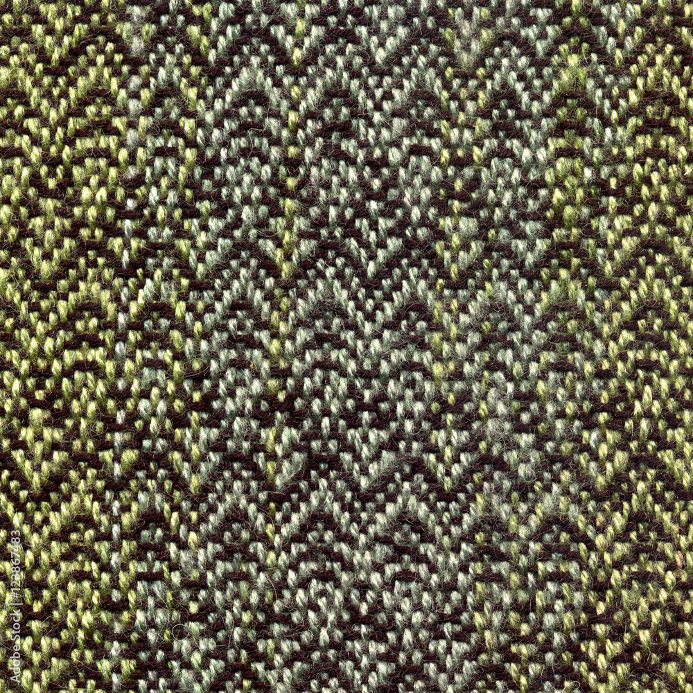 Closeup of handwoven pattern with monochrome weft Closeup of handwoven pattern with monochrome weft